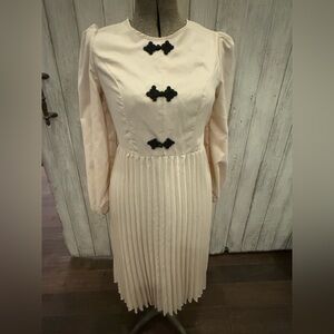 Elegant Cream Dress with Black Accents